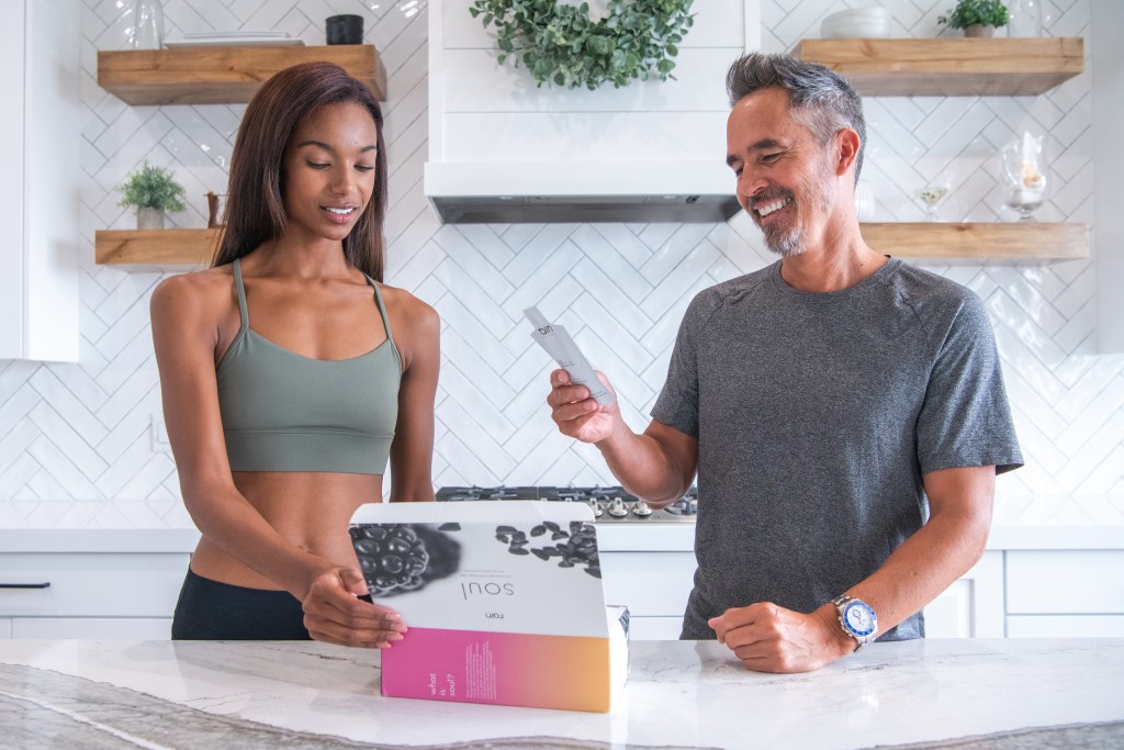 2 people looking at the product